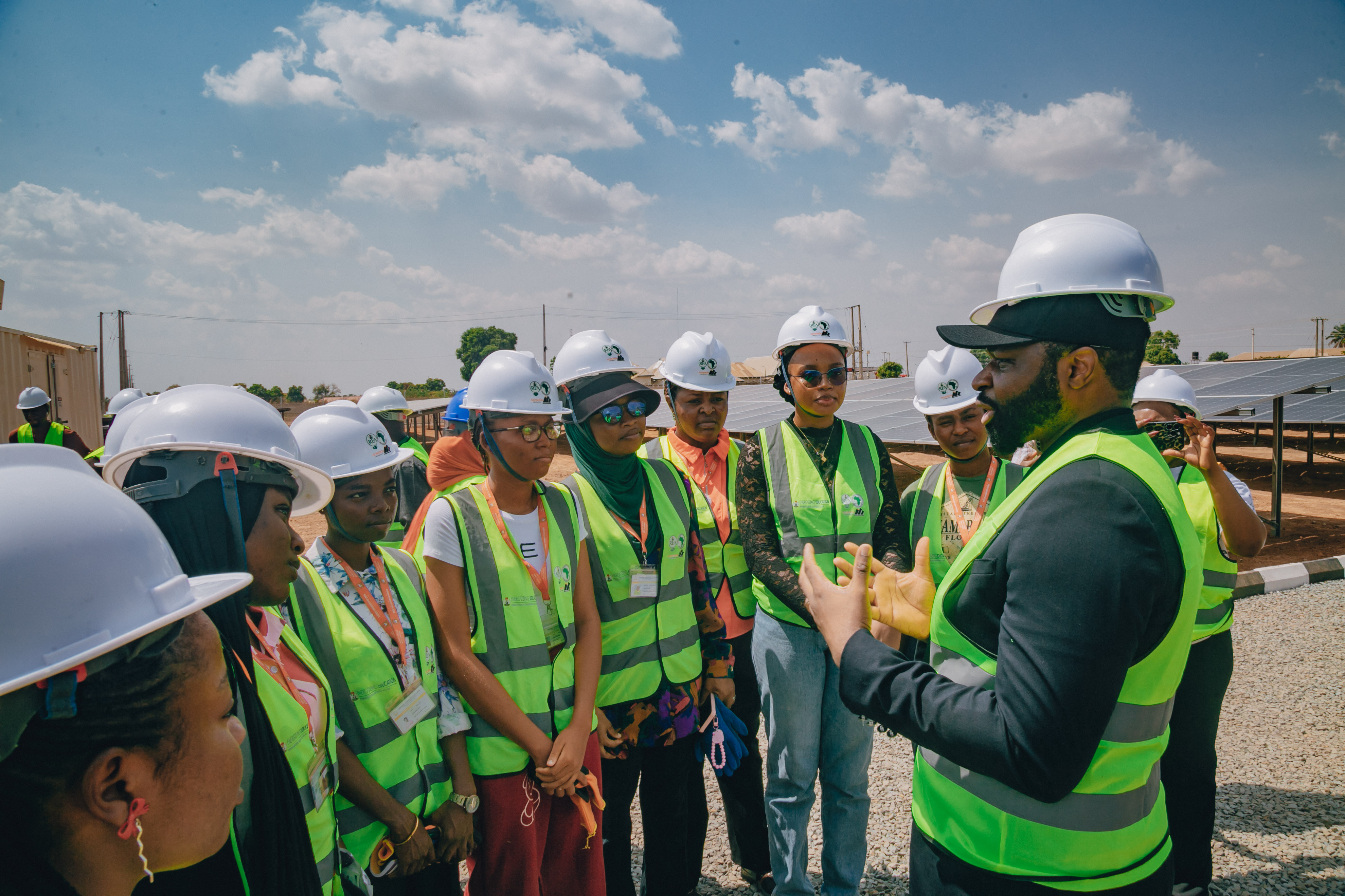The Head, Nigeria electrification programme, Mr. Olufemi Akinyelure mentoring the female STEM students on the future career opportunity in the Renewable energy during an inspection to FULAFIA solar hybrid plant facility deployed under EEP Phase III.